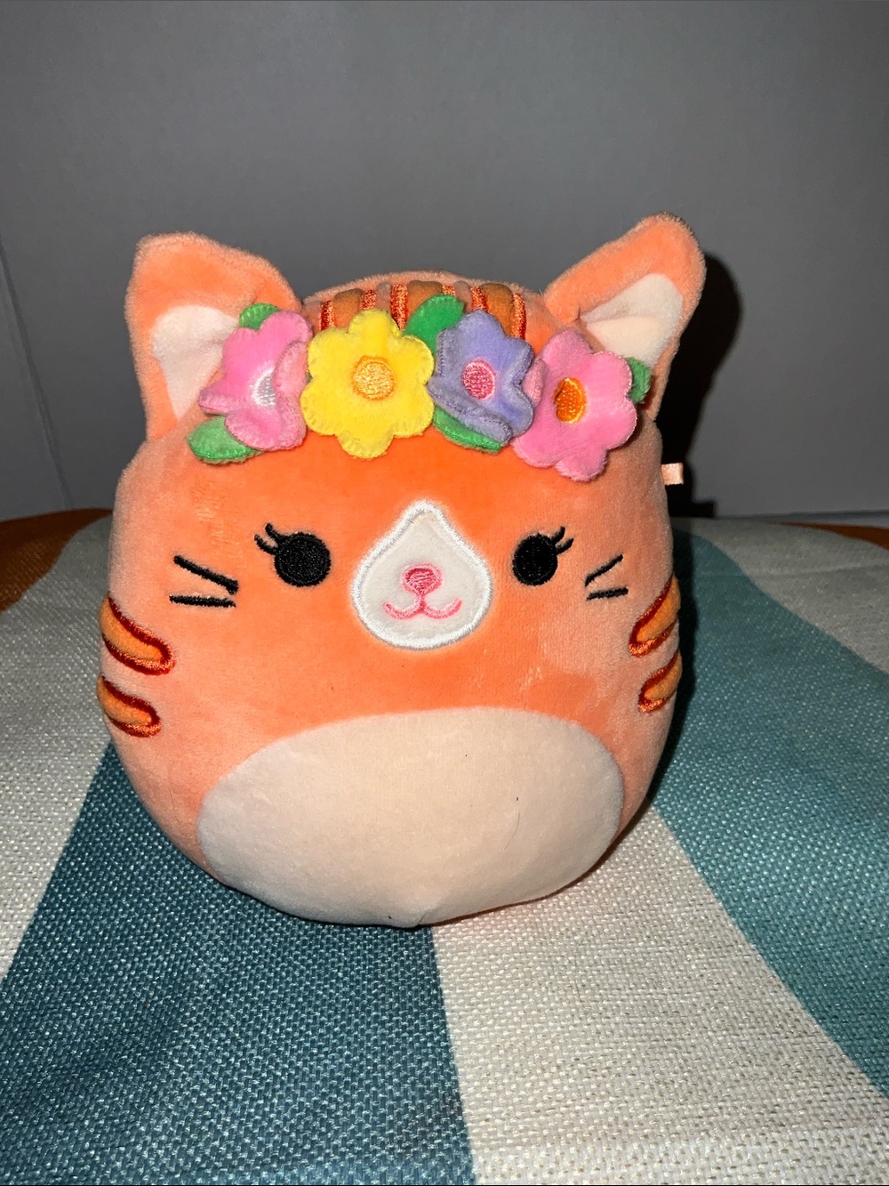 Squishmallows Gigi the Orange Cat Plush with Multicolor Flower Crown Collectible